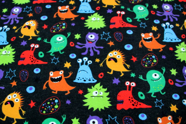 Monsters on Black Printed Flannelette