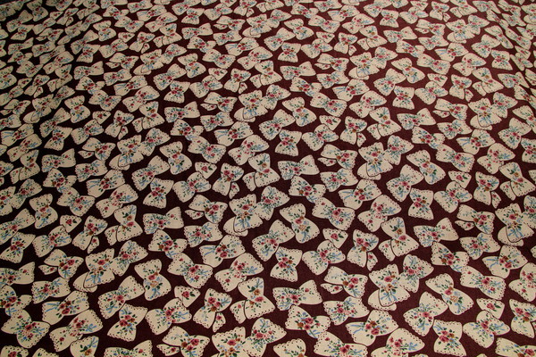 Bows on Brown Printed Cotton