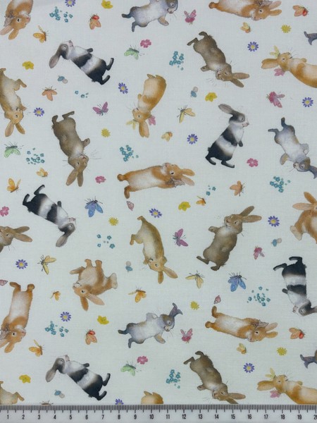 Happy Bunnies on Soft White Printed Cotton