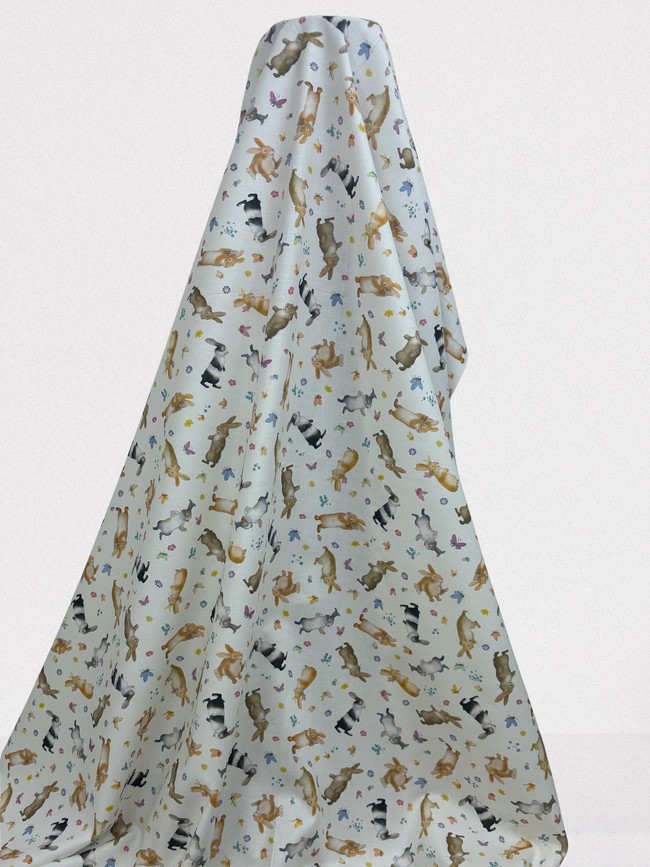 Happy Bunnies on Soft White Printed Cotton