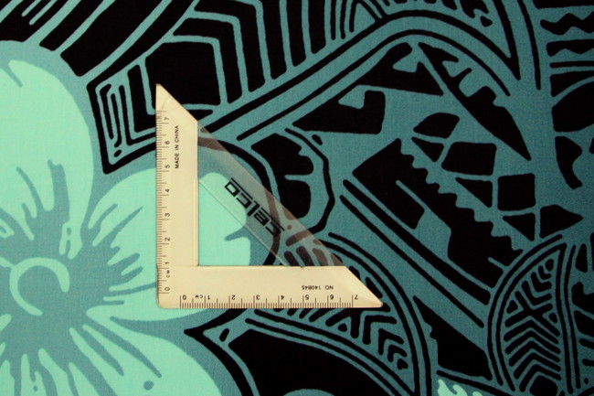 Aqua Blue & Black Pacific Design On Dark Airforce Printed Cotton