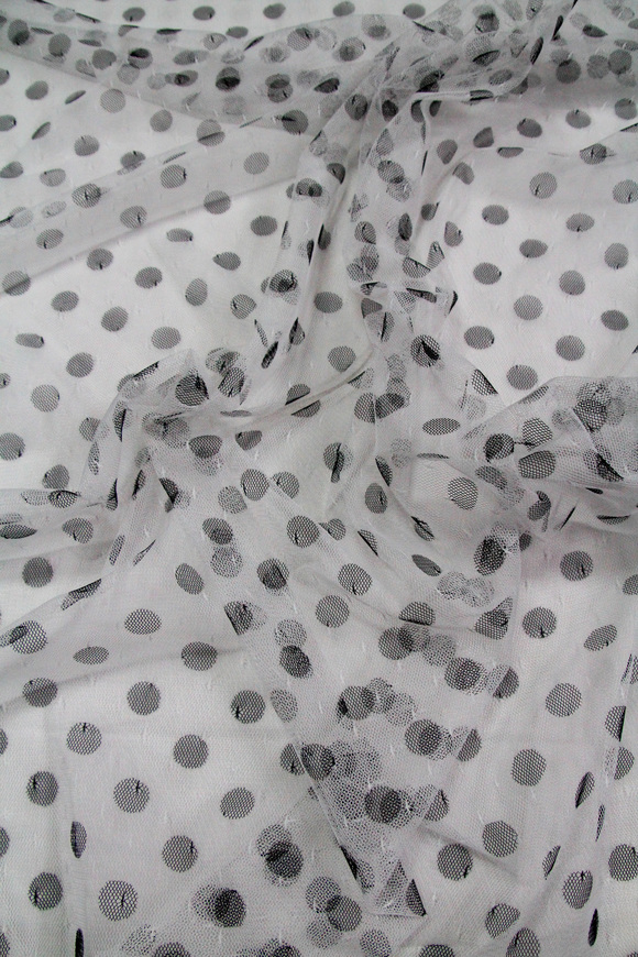 Black Spots on White Netting