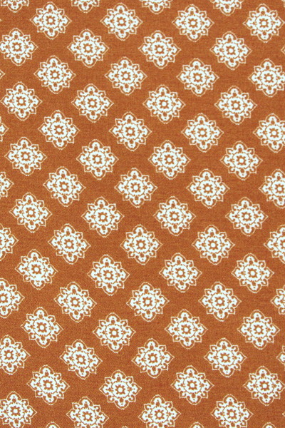 Classic White Floral Design on Gingerbread Printed Rayon with Crepe Finish