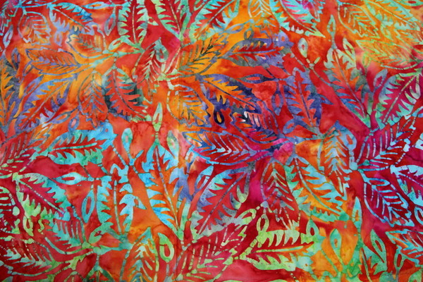 Flame Toned Leaf Print on Multi-Coloured Batik Cotton