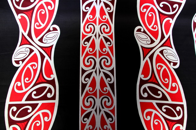 Red & White on Black Traditional Maori Design Printed Dobby