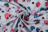 Fairyland Toodstools on Printed Light Blue Flannelette
