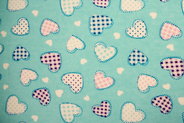 Patchwork Hearts on Soft Aqua Printed Flannelette