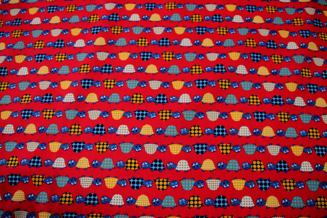 Turtle Race on Red Printed Cotton
