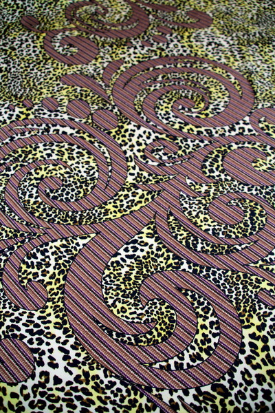 Flourishes on Leopard Printed Silky-Feel Polyester