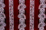 White & Black on Burgandy Traditional Designs of Aotearoa