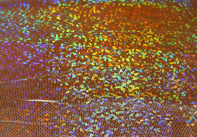 Silver Holograhpic Foil on Orange Trilobal Knit New Image