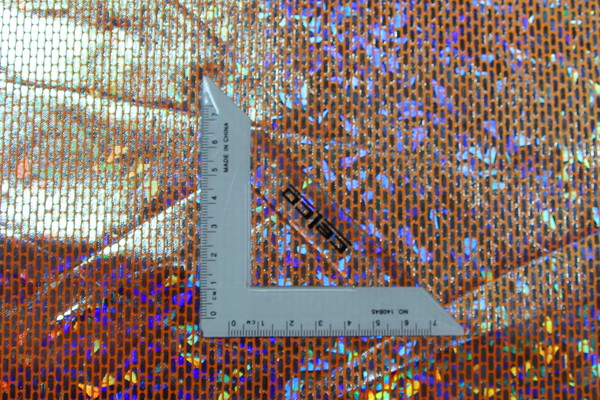 Silver Holograhpic Foil on Orange Trilobal Knit New Image